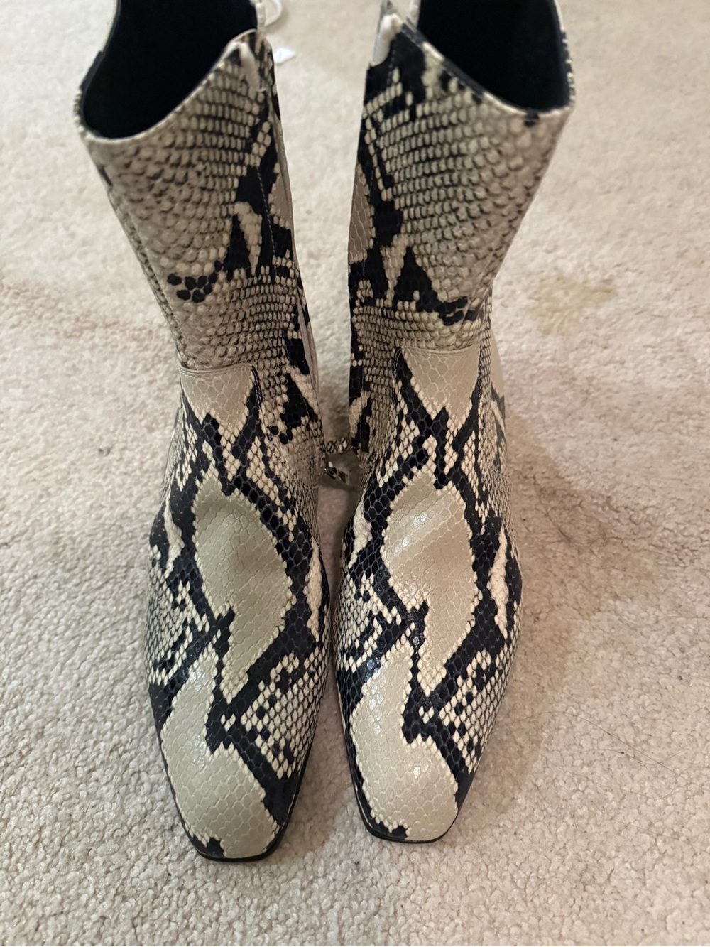 Khaite snake print boots